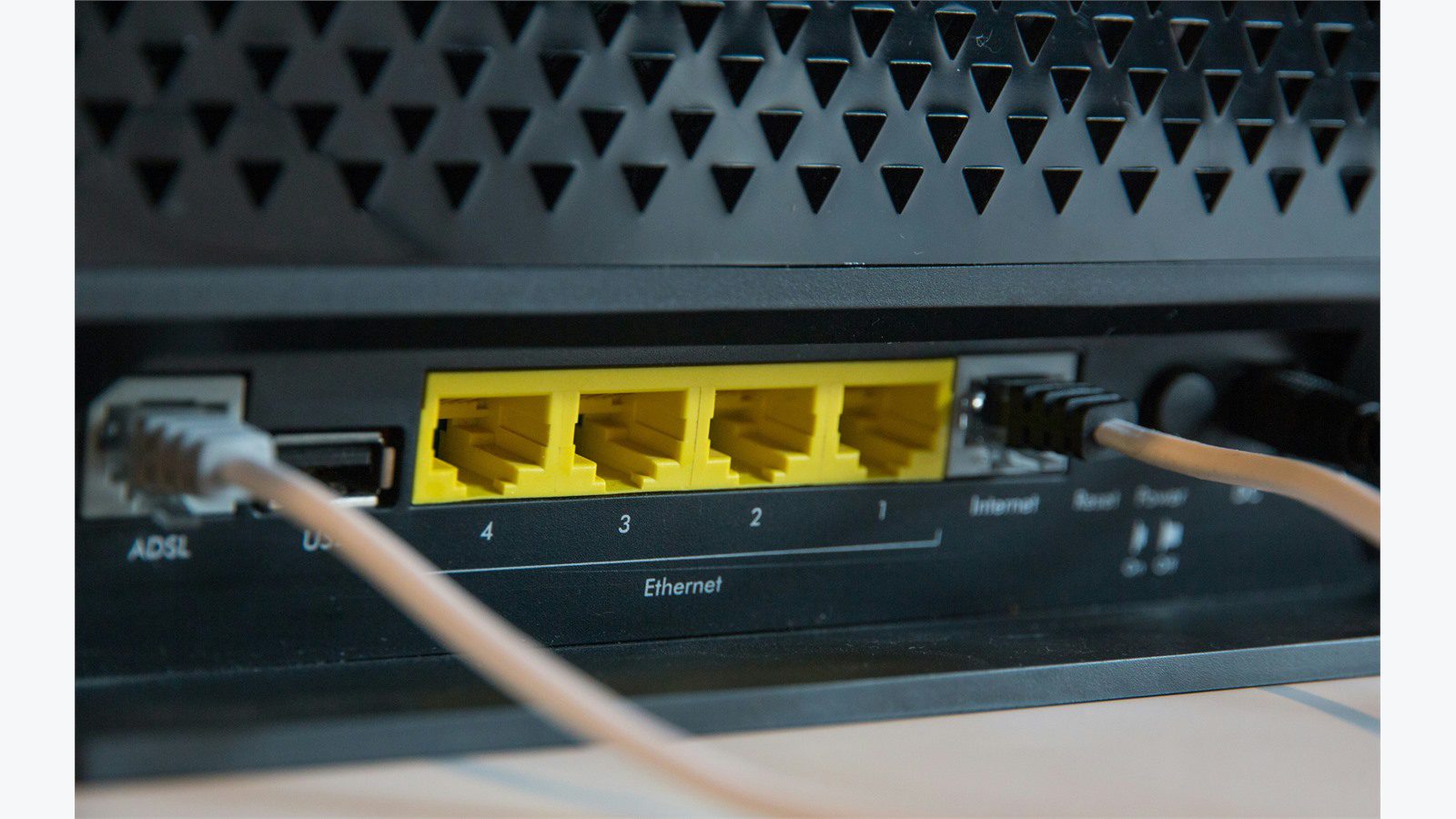 Remote Worker Laptops: 9 Easy Ways to Secure Them 18 network router hardware representing secure Wi-Fi VPN and remote network access rules