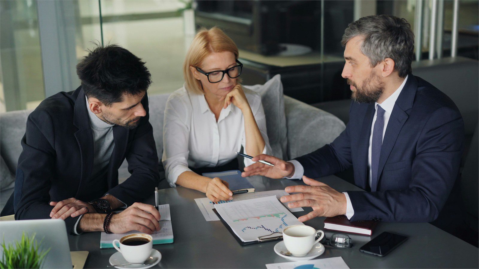 Responsible AI Ethical Framework: 7 Proven Business Wins 13 business leaders discussing AI governance risk and ethical framework decisions around a meeting table