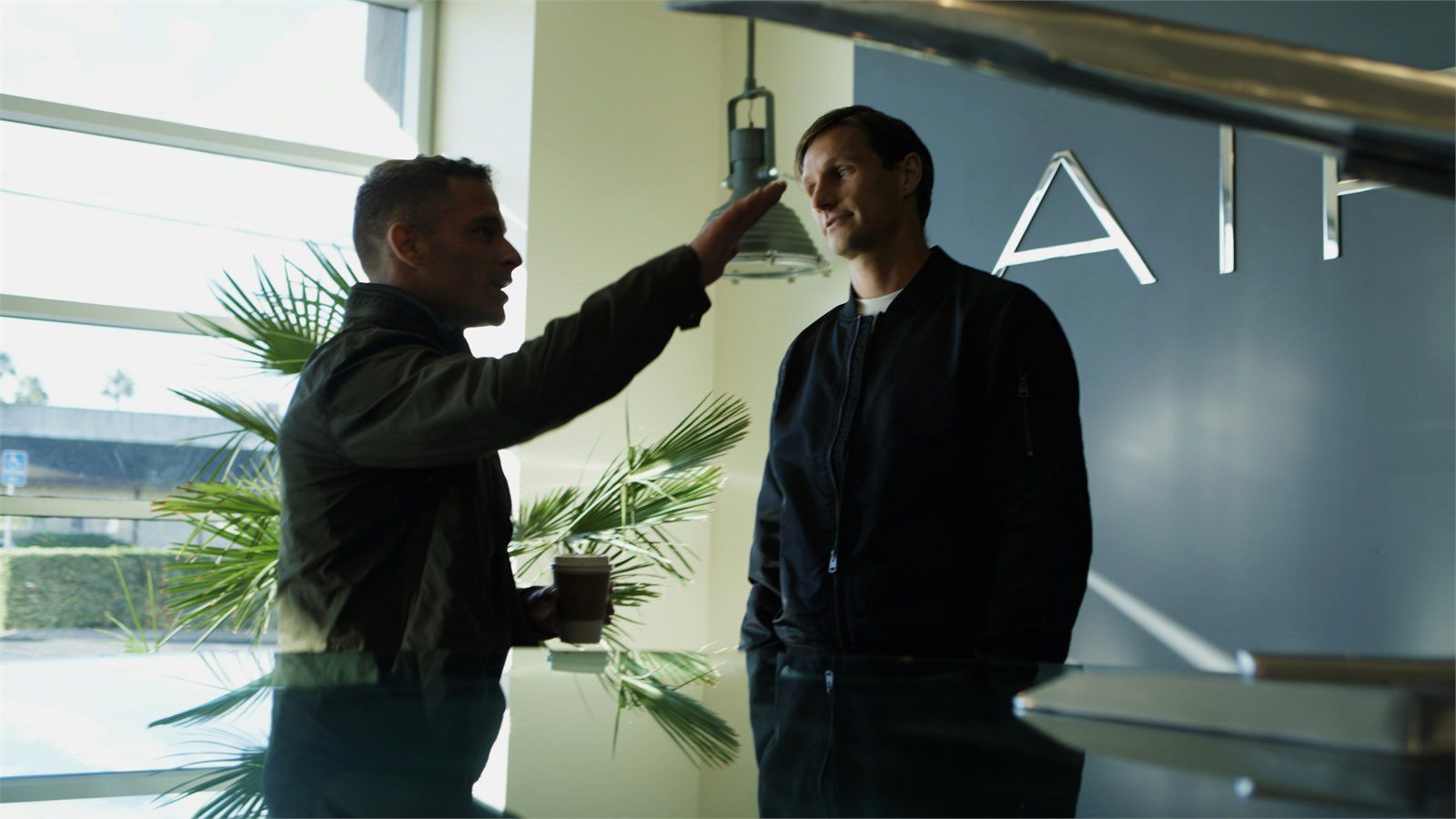 Responsible AI Ethical Framework: 7 Proven Business Wins 14 team reviewing AI principles scope and ownership beside an artificial intelligence presentation board