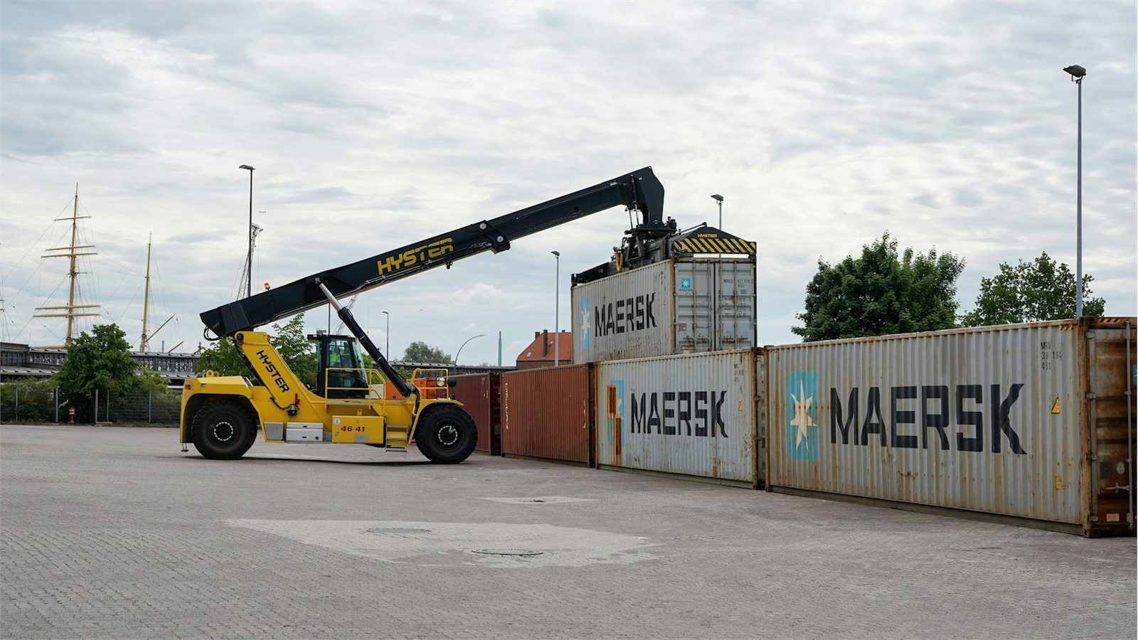 reach stacker lifting a container representing conflict handling duplicate records and failed update queues