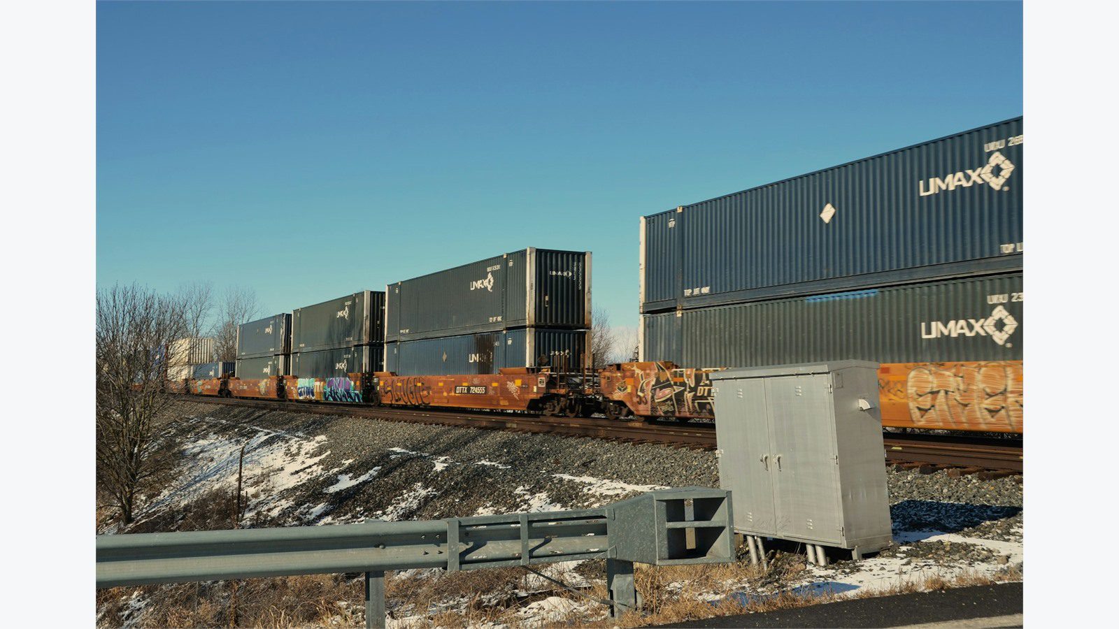 cargo train with containers representing Salesforce data sync FAQ for shipping and logistics portal teams