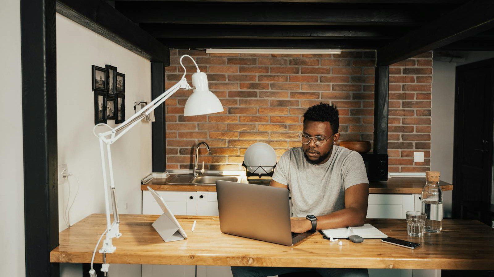 Secure remote work environment: a tidy home office desk with a laptop ready for remote work