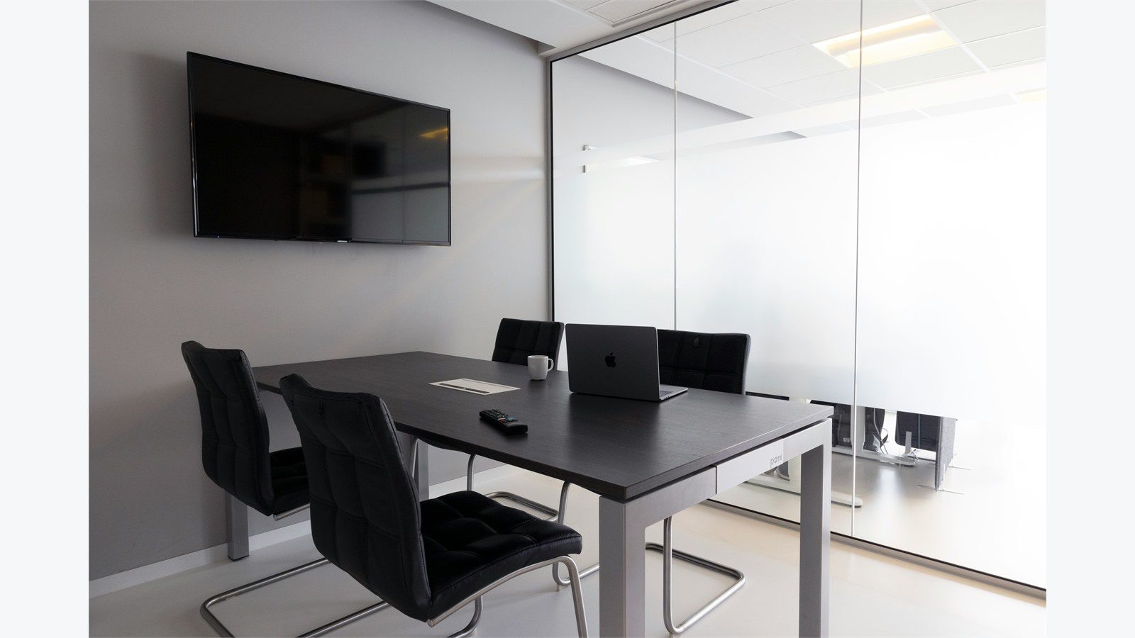 Smart Office Automation: 9 Powerful Energy Wins 18 modern meeting room with display and conference table for hybrid work automation and energy savings