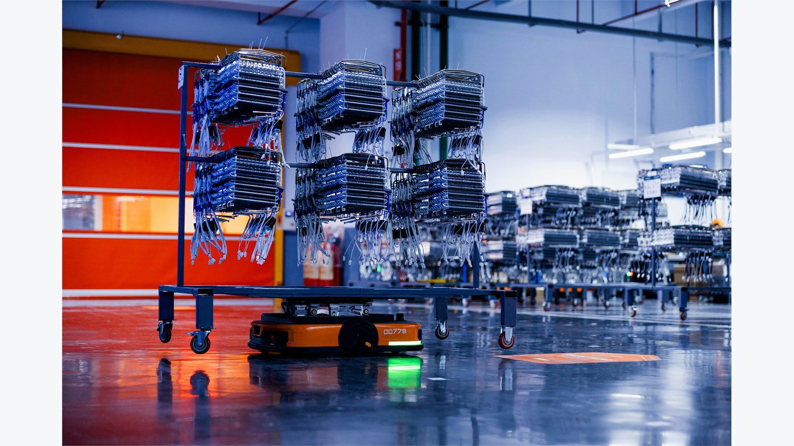 Smart Warehousing Uses IoT and AI: 9 Powerful Wins 15 autonomous warehouse carts carrying inventory for AI forecasting slotting and replenishment planning