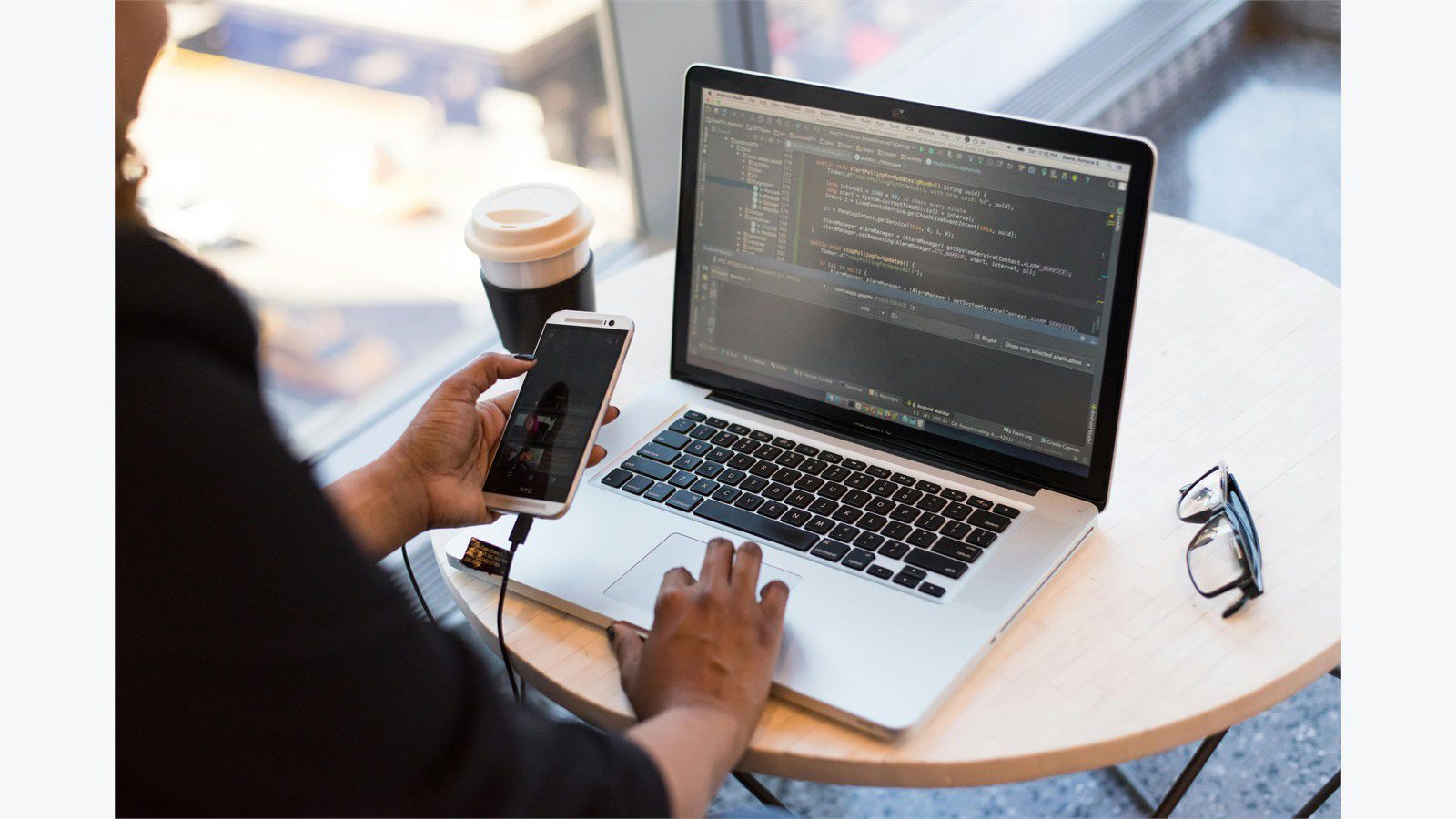 Software Refactor: 7 Powerful CFO Approval Checks 13 finance leader using a laptop to define the business problem before approving code cleanup work