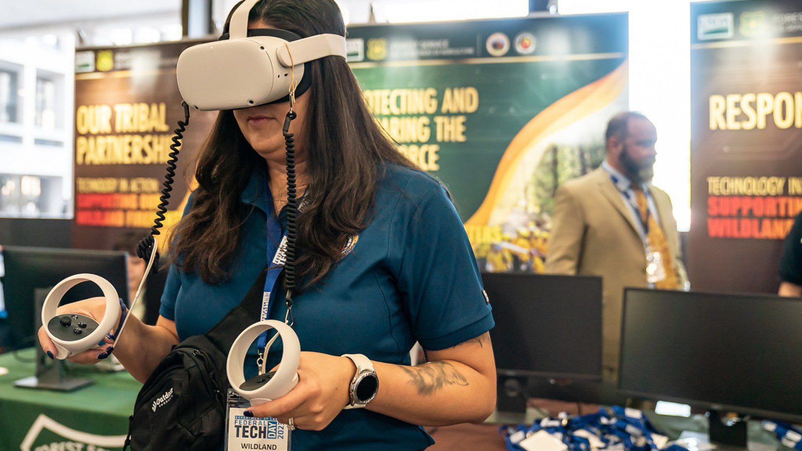 Spatial Computing: headset user viewing an immersive workspace display.