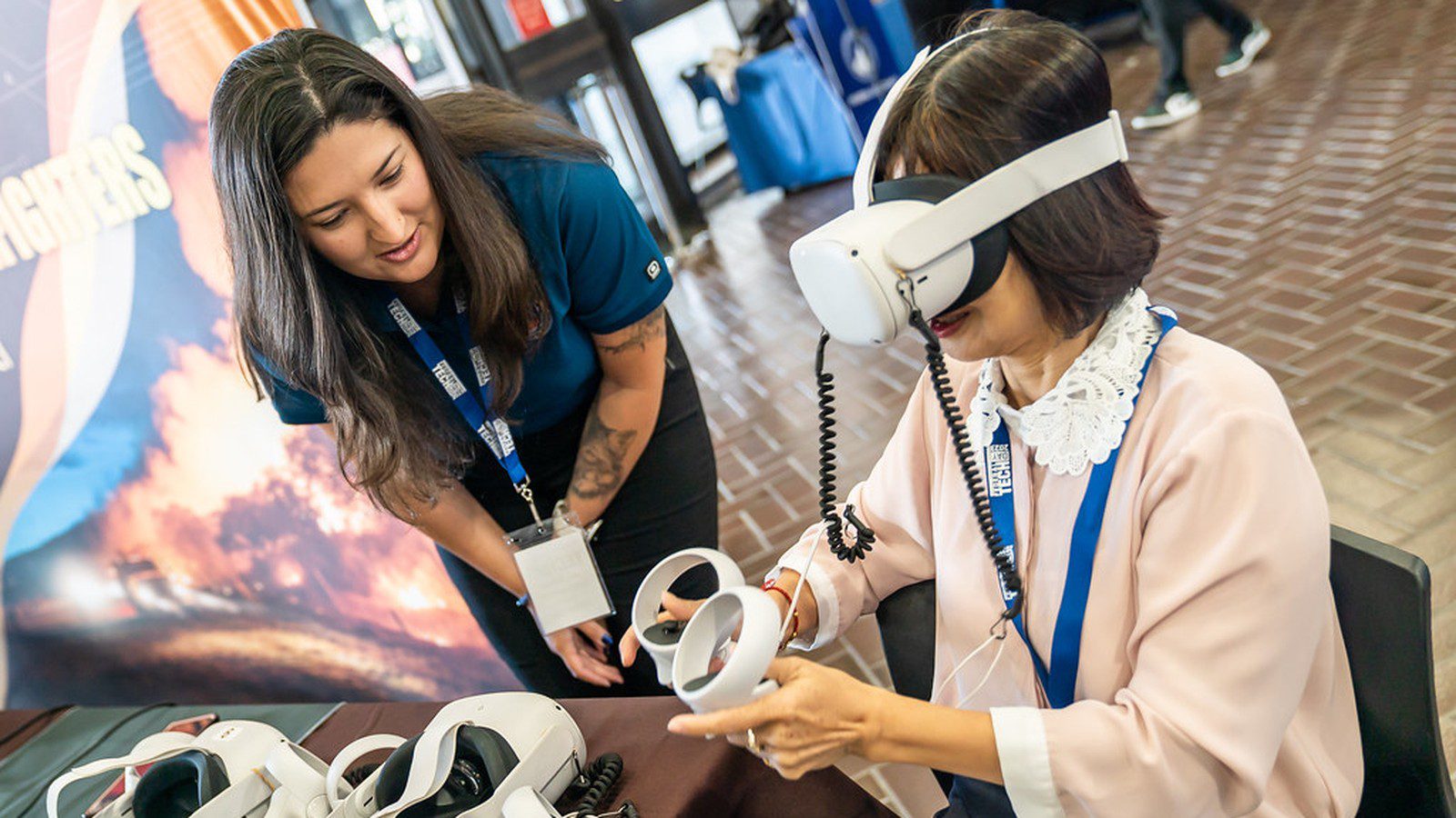 Spatial Computing: trainer guiding a participant through a VR training demonstration.