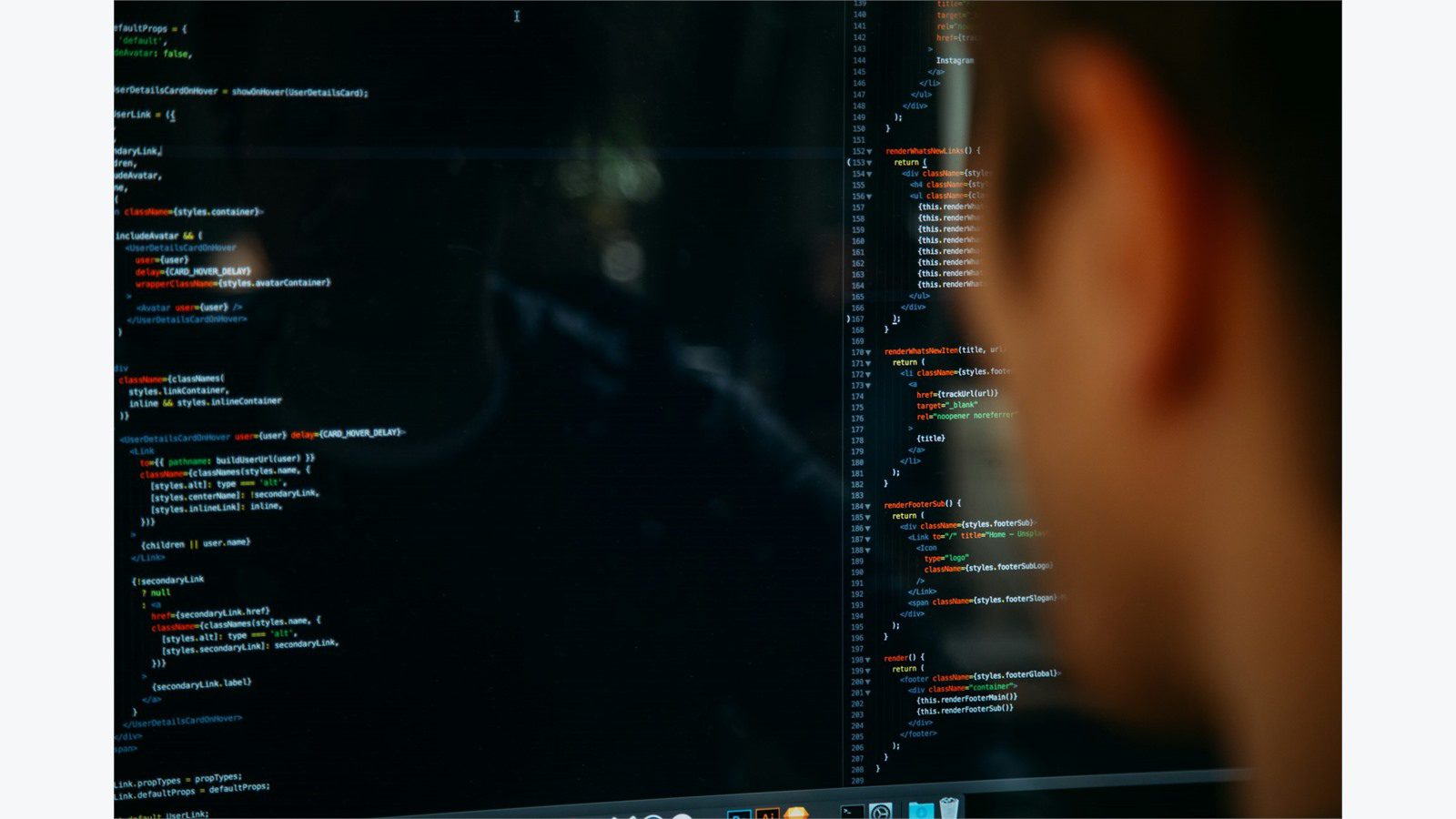 Staff member reviewing security alerts to detect AI-powered phishing on a corporate workstation