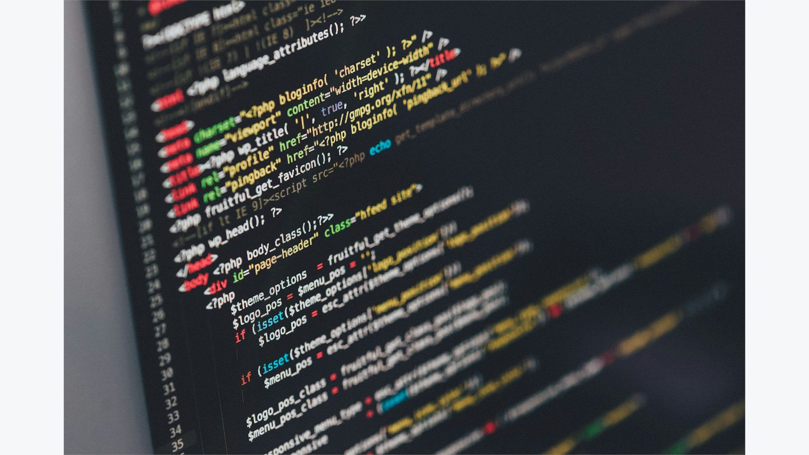 How to Train Your Staff to Detect AI-Powered Phishing Attacks: 8 Proven Steps 13 Computer monitor displaying complex code patterns representing AI-powered phishing threat complexity
