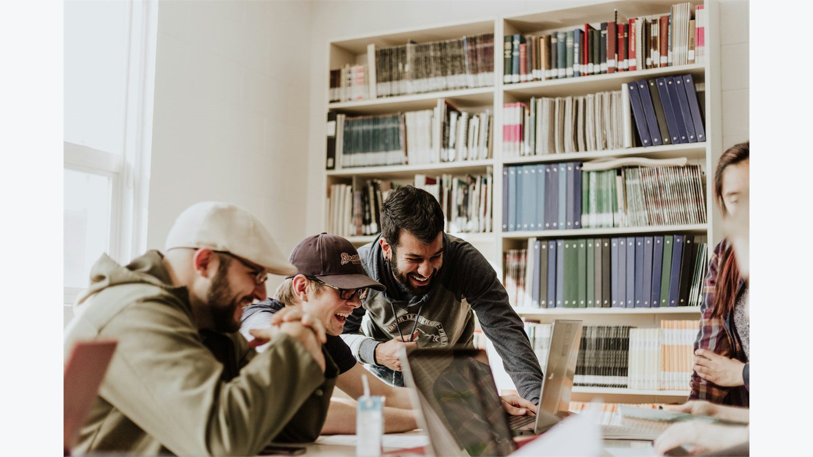 How to Train Your Staff to Detect AI-Powered Phishing Attacks: 8 Proven Steps 14 Team members collaborating on laptops during an AI-powered phishing simulation baseline exercise