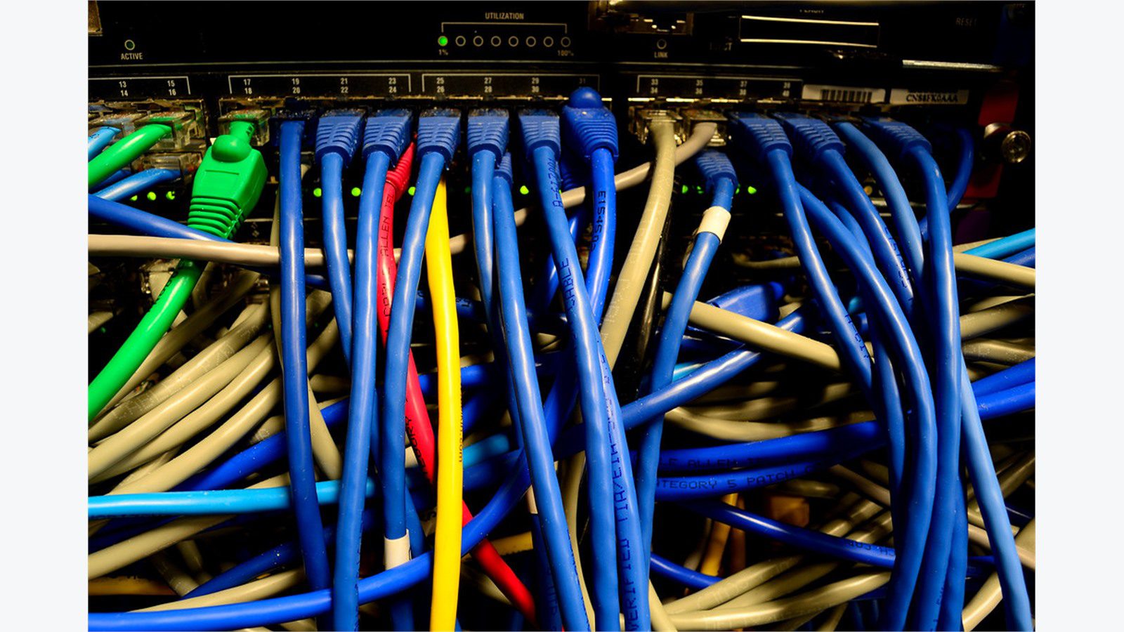 network rack cables representing SIP firewall and media path checks for VoIP call quality