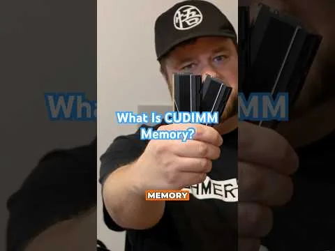 progressive Robot holding several memory sticks toward the camera, with on-screen text “What Is CUDIMM Memory?”