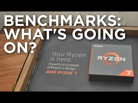 progressive Robot Benchmarks: What’s going on? text over AMD Ryzen 7 promotional box on a wooden desk