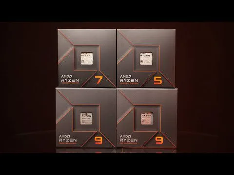 progressive Robot four AMD Ryzen processor boxes labeled Ryzen 7, Ryzen 5, and two Ryzen 9 on a dark background