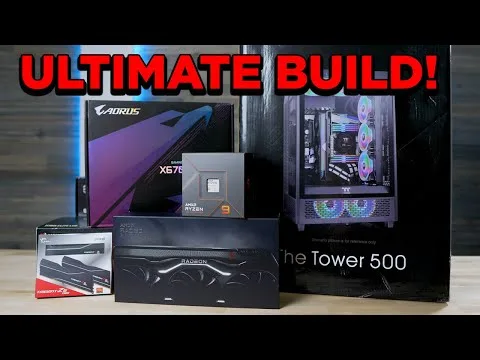 progressive Robot, PC component boxes and a Tower 500 case with “ULTIMATE BUILD!” text across the top