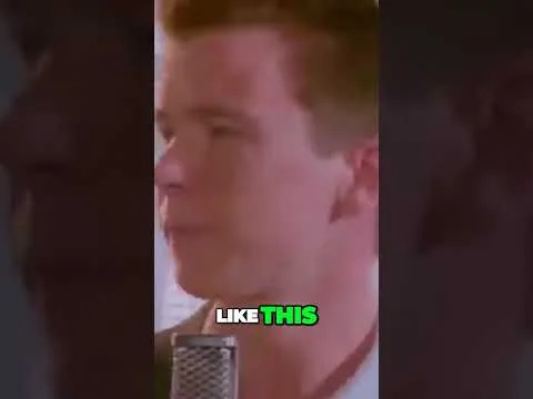 progressive Robot close-up of a man singing into a microphone, with the caption "LIKE THIS" in white and green text
