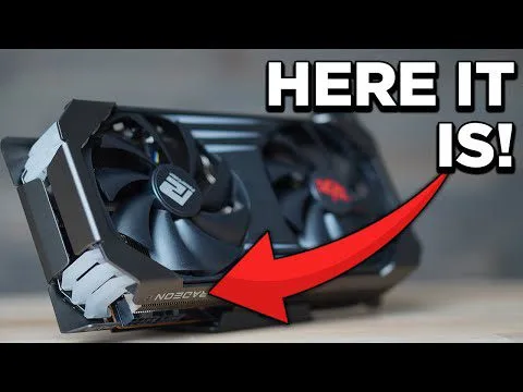 Progressive Robot - Graphics card lying on a desk with a red arrow pointing to it and the text HERE IT IS!