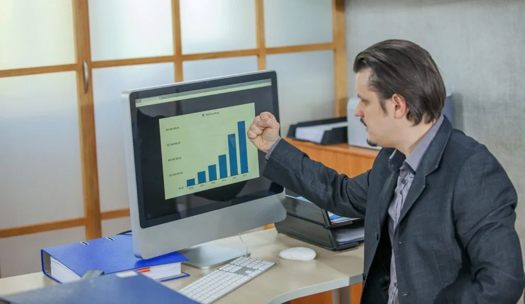 business-leader-reviewing-IT-performance-metrics