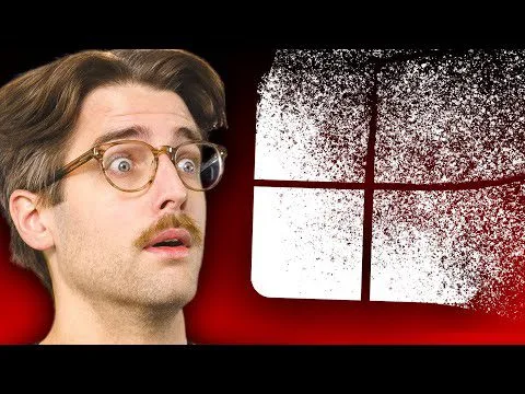Surprised man with glasses looking at a glitchy Windows logo on a red background, Progressive Robot.