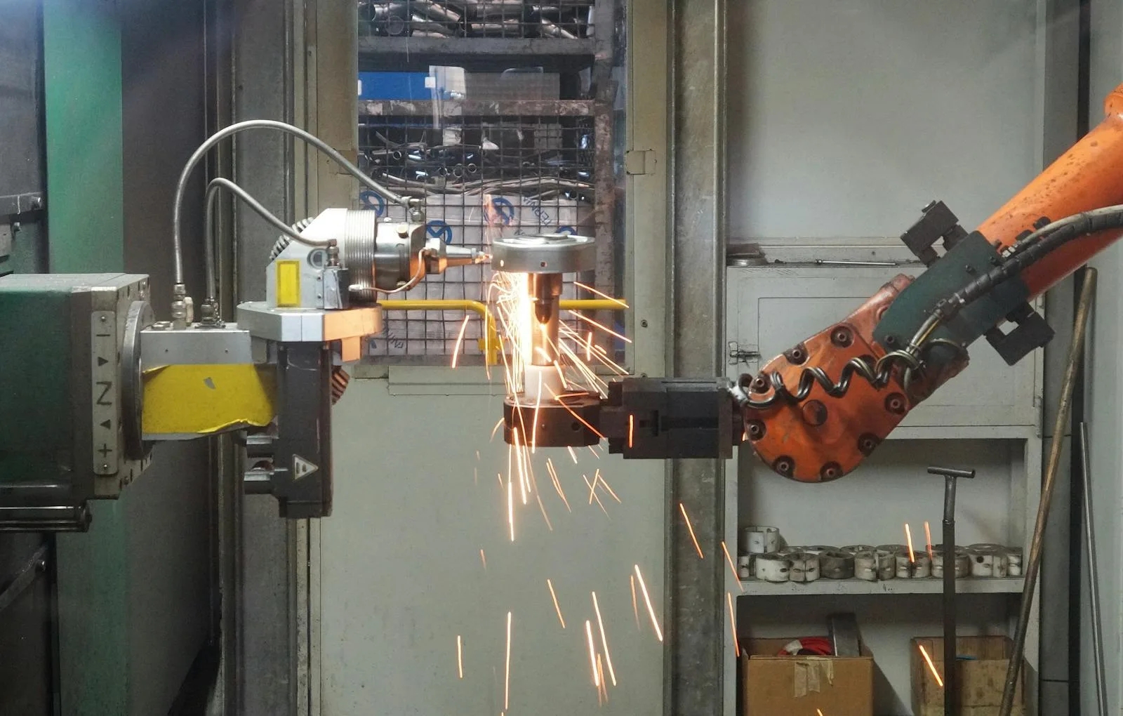 Hyundai Robotics: 7 Powerful Facts on Its Physical AI Strategy 24 FAQ section on Hyundai robotics and physical AI represented by office workers discussing technical concepts around a conference table