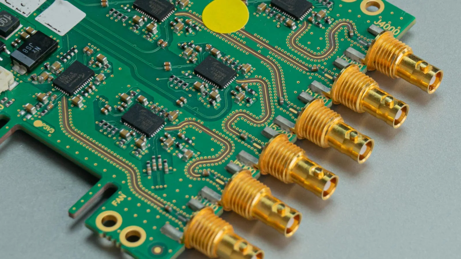 Sony image sensor factory Japan subsidy at a glance shown by a semiconductor circuit board representing CMOS image sensor production