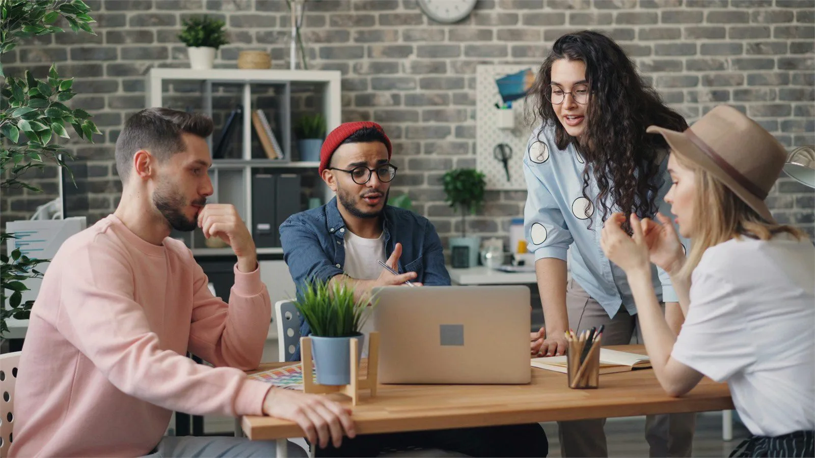 AdsCreator.com: 7 smart ways to launch winning ads 16 Creative review concept with coworkers solving campaign problems before launch