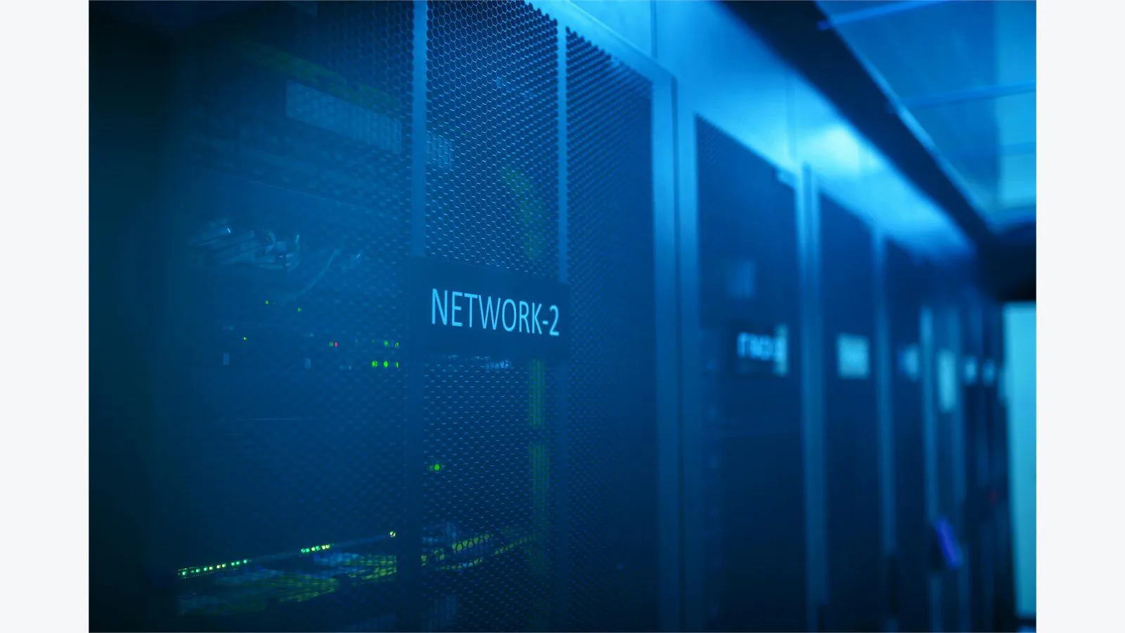 AI Galaxy Hunters: 7 Stark Truths About the GPU Crunch 12 AI galaxy hunters compute concept with a modern server room glowing under blue network equipment lights