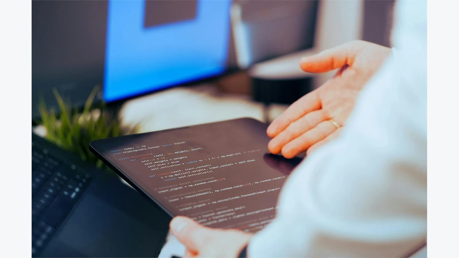 Developer reviewing code and dependency details on a tablet before a migration starts