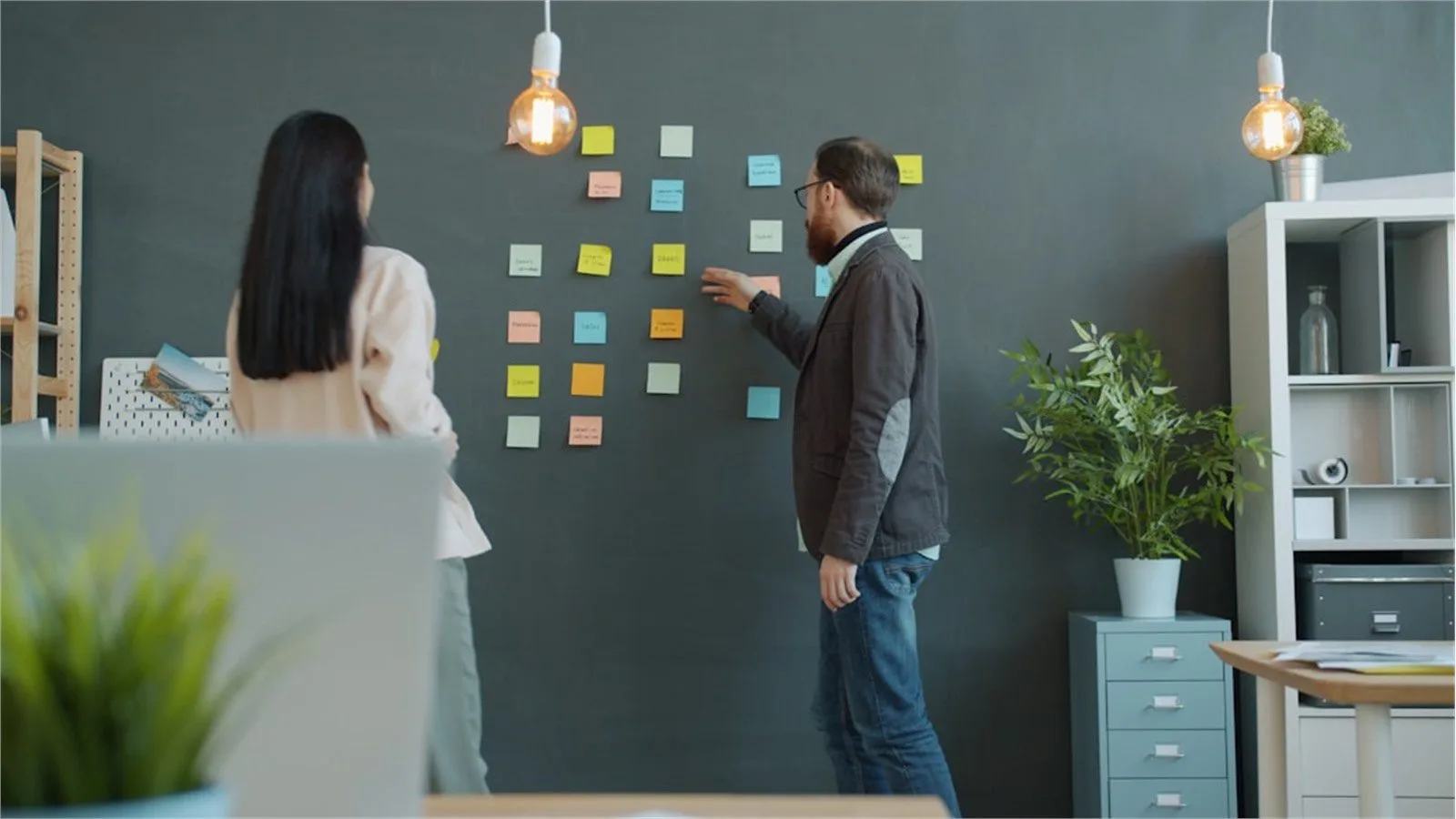 Browser Harness: 7 Powerful Reasons It Matters 14 Team planning with sticky notes to evaluate a Browser Harness pilot in a real workflow