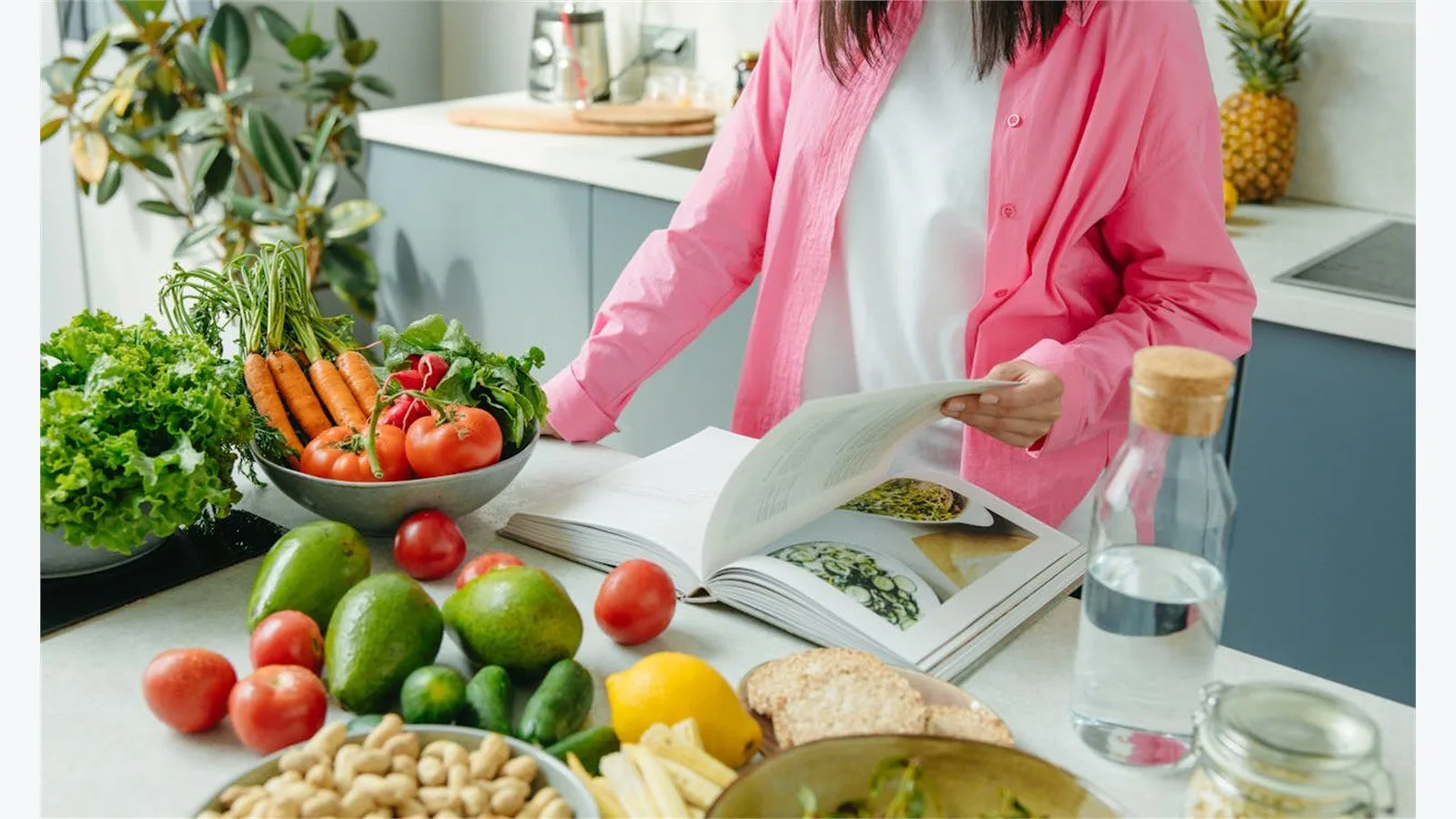 CalBye Review: 9 Smart Features for Better Nutrition 15 CalBye product detail concept with a person reviewing kitchen guidance near fresh vegetables
