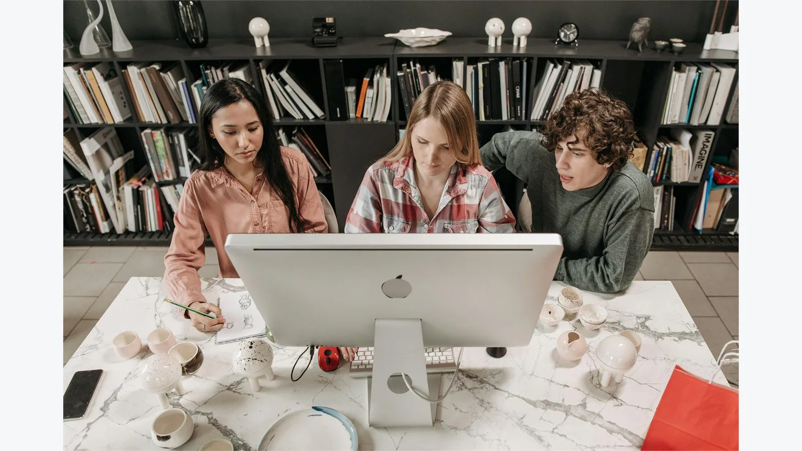 Clico Review: 7 Smart Wins for Browser-First Writing 13 Clico workflow concept with an office team reviewing work on a shared computer