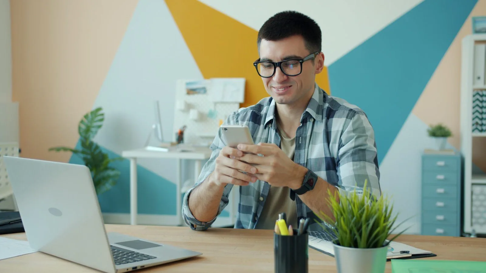 Noscroll AI: 7 smart ways to beat doomscrolling 16 Privacy and trust concept with a professional reviewing phone updates carefully at an office desk