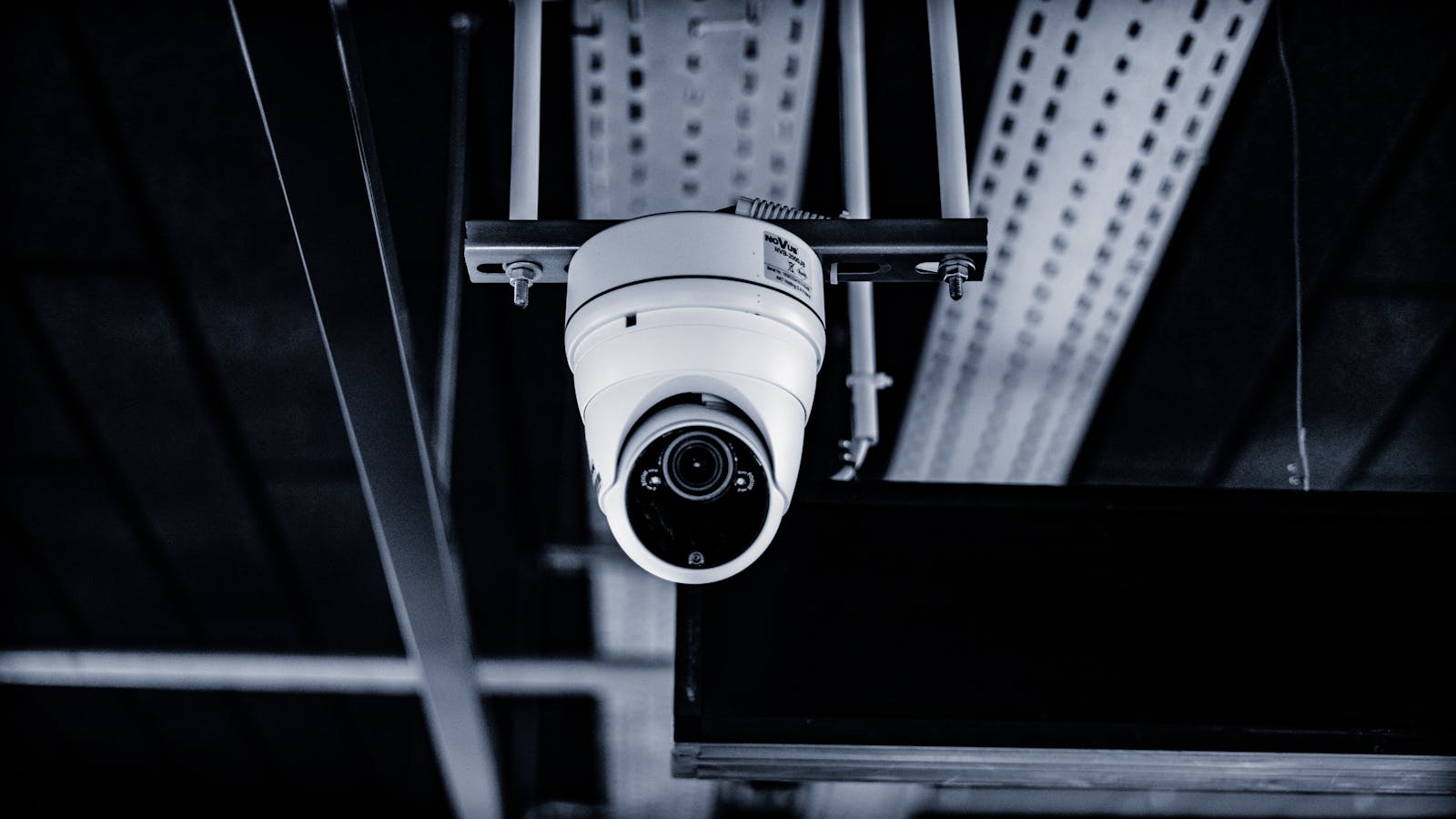 Surveillance camera representing memory safety and security monitoring for AI systems