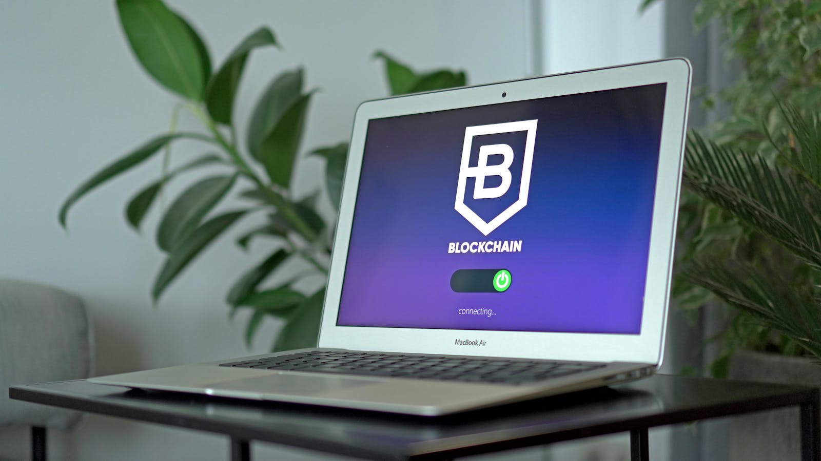 Vibe-jacking brand protection shown on a cybersecurity laptop dashboard