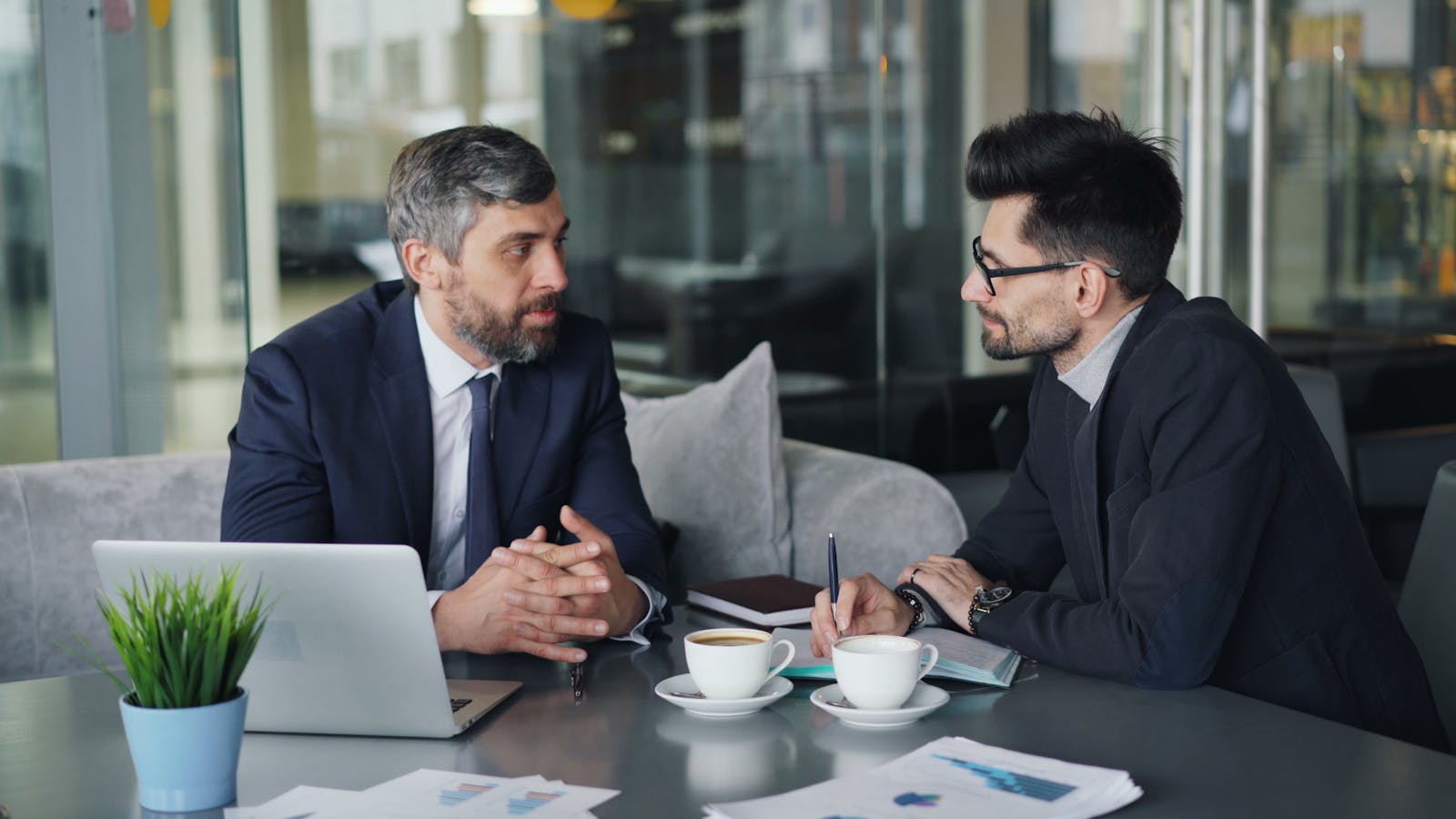 Business leaders coordinating marketing security and legal response to brand impersonation