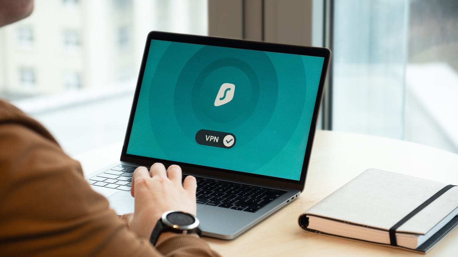 secure VPN laptop showing human in the loop guardrails for autonomous IT agents