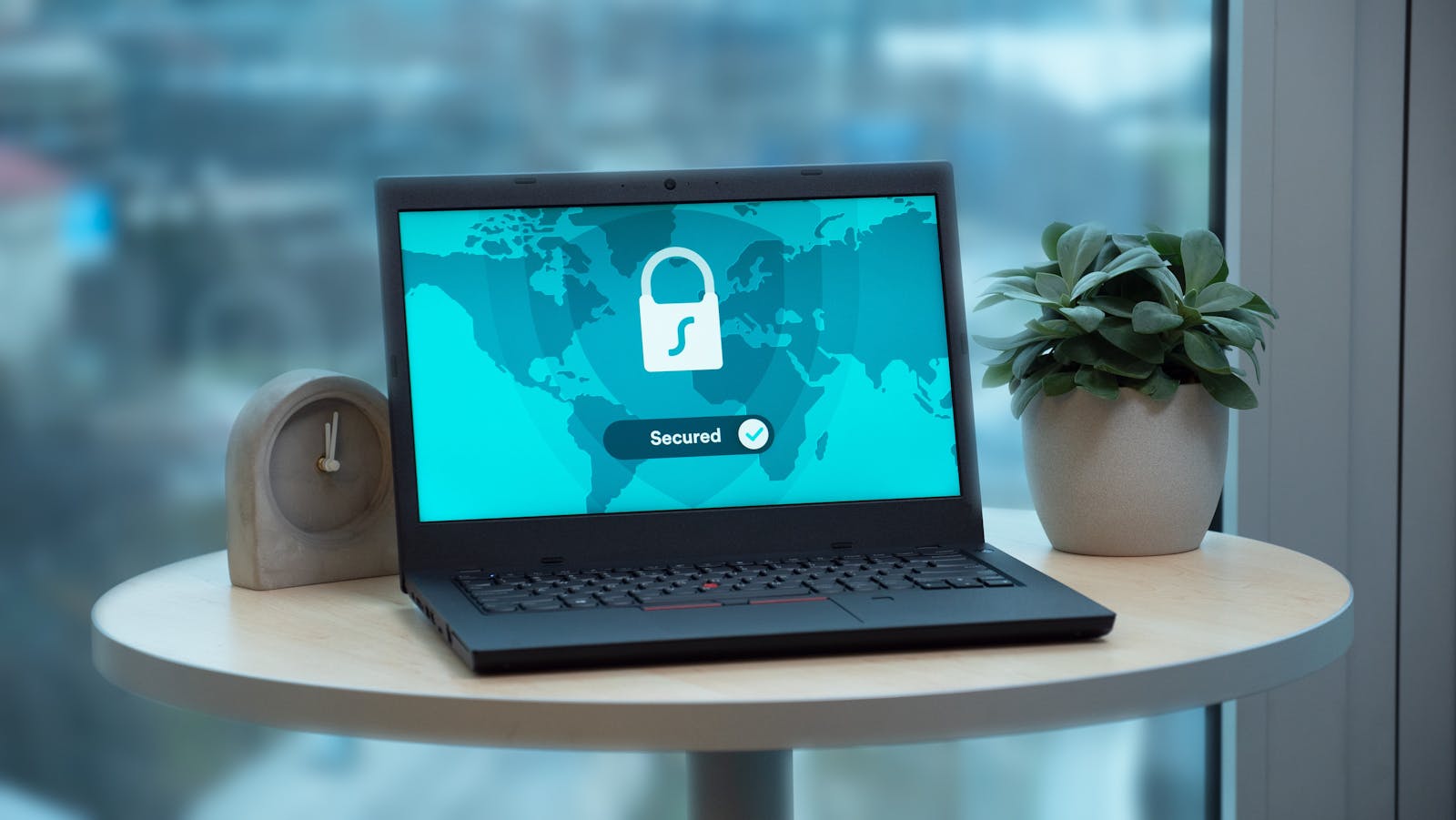 Zero-Touch IT: 8 Powerful Ways to Cut Helpdesk Load 16 laptop with security lock icon for password access and device workflows in Zero-Touch IT
