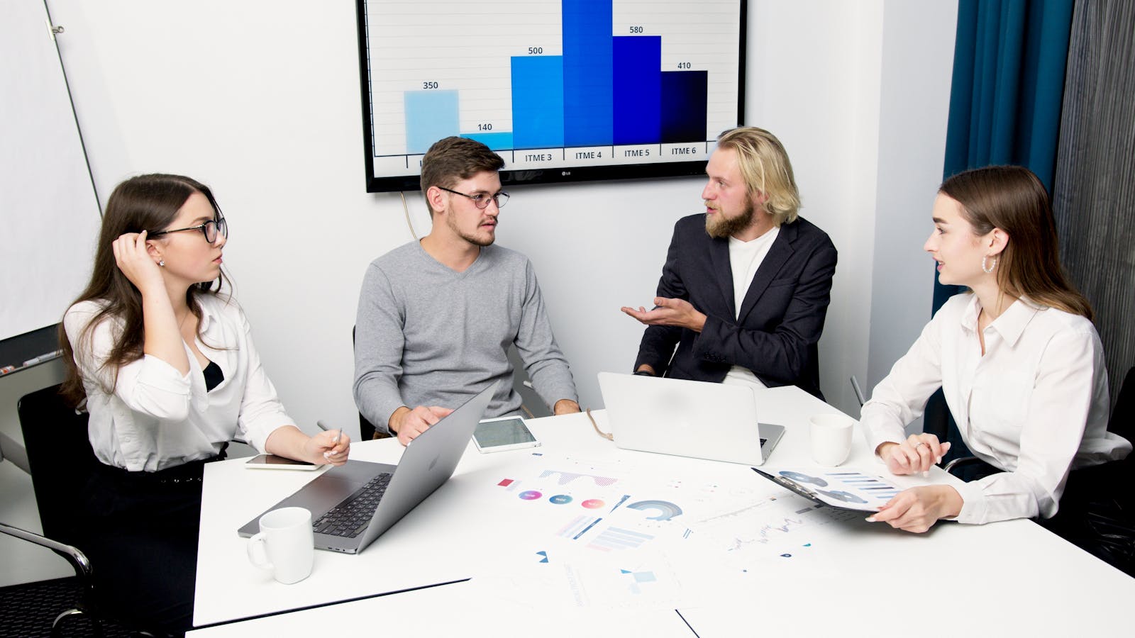 Zero-Touch IT: 8 Powerful Ways to Cut Helpdesk Load 19 team reviewing service desk resolution quality metrics and automation outcomes