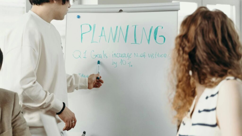Business Central implementation planning shown through a team strategy meeting