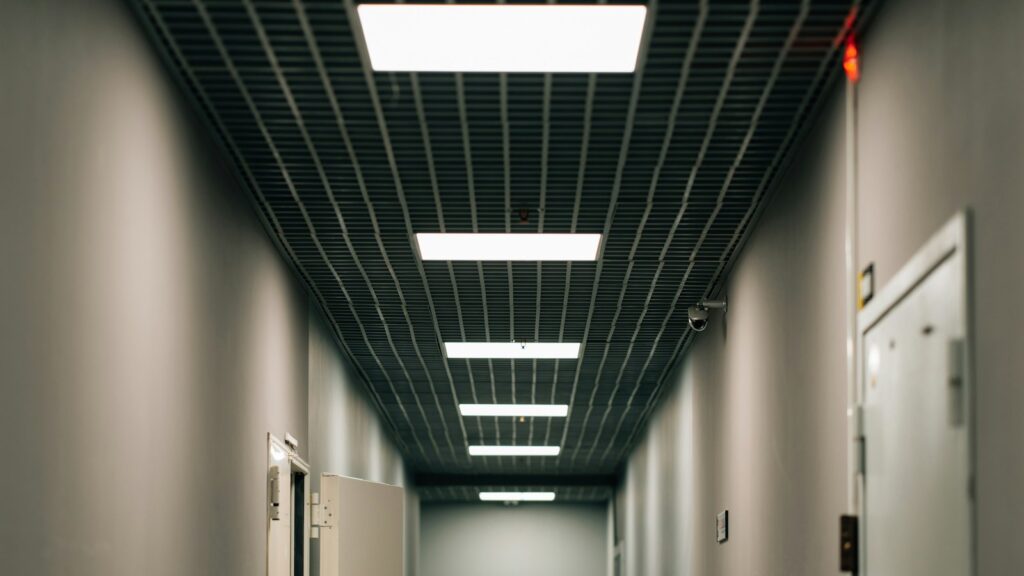 Bright office corridor lighting illustrating how Li-Fi security can use room lighting infrastructure