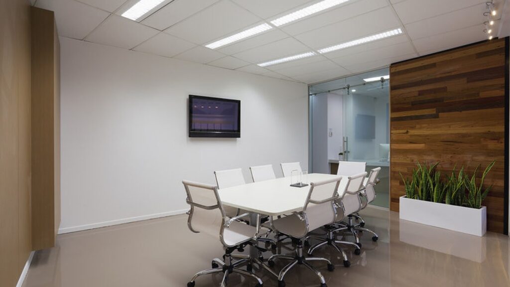 Empty conference room ready for an automated meeting-room booking workflow