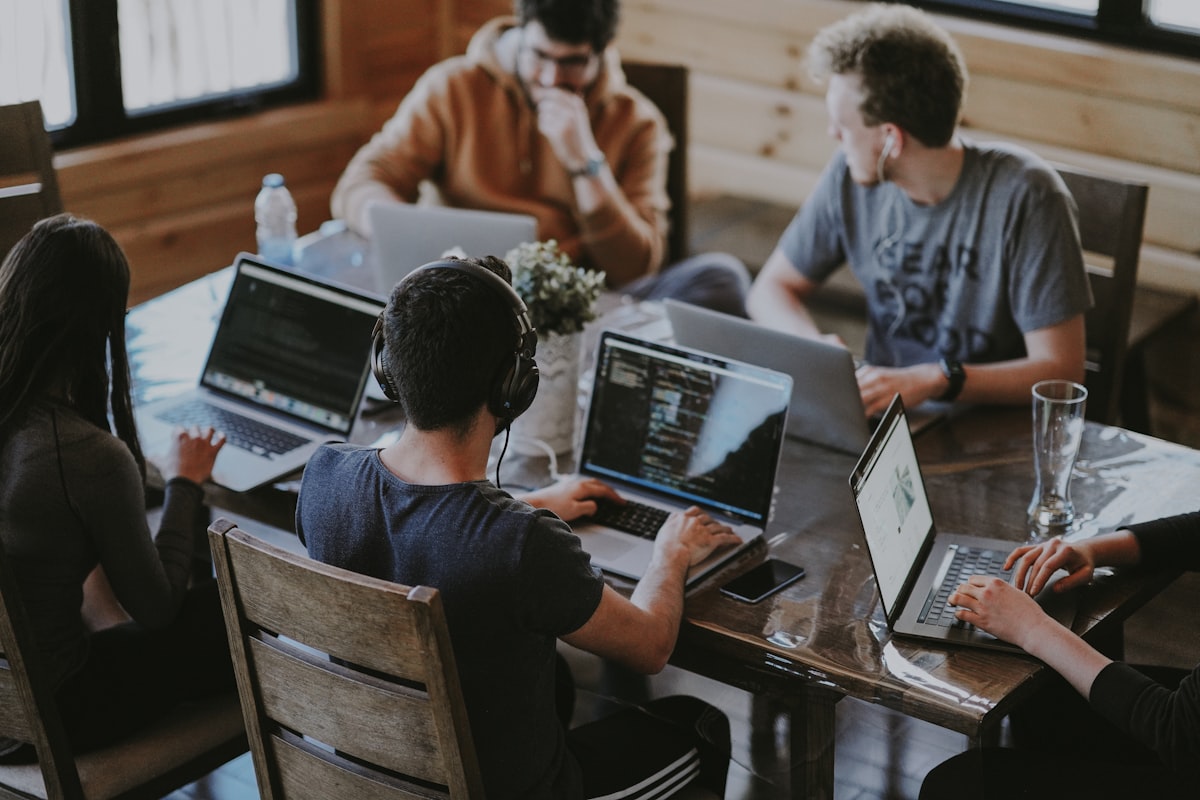 IT professionals collaborating in a modern tech office